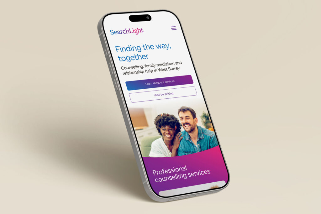 SearchLight mobile homepage showing on a phone